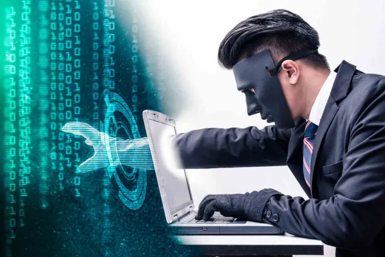 A man wearing a black mask and gloves is seated at a laptop, seemingly engaging in hacking activities. His right arm appears to be digitally extended into the computer, blending with a backdrop of binary code and digital elements, representing the concept of cybercrime and data breaches. The man's attire, a suit and tie, contrasts with his illicit actions, highlighting the seriousness of cybersecurity threats.